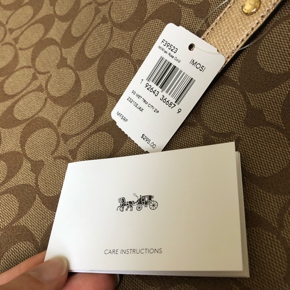 SOLD Coach City Zip Closure Signature Canvas Tote - Picture 8 of 8